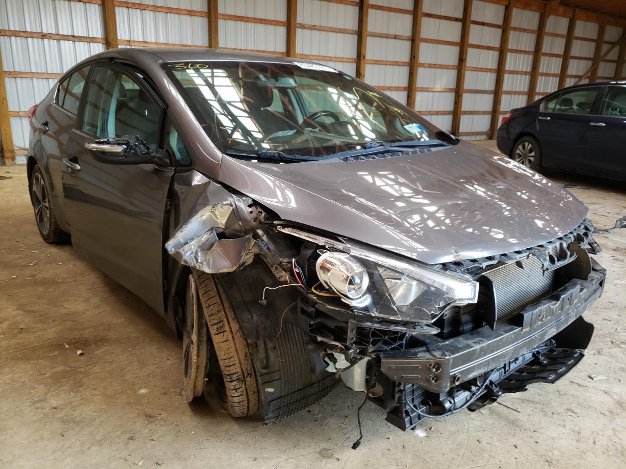 KIA FORTE EX 2014 with VIN KNAFX4A88E5165822 - Photo from auction