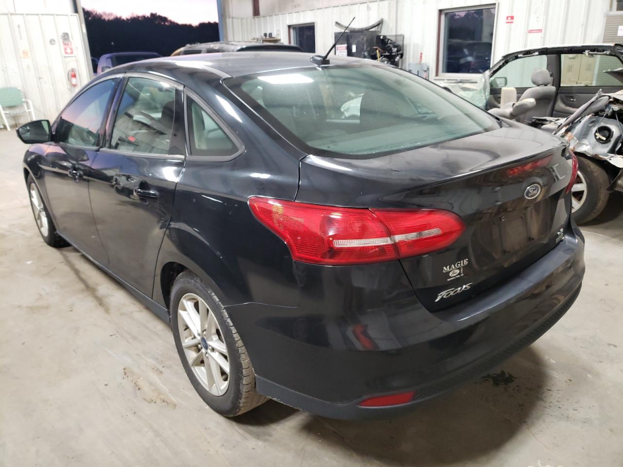 Photo 3 from auction – 2015 FORD FOCUS SE with VIN 1FADP3FE9FL381992