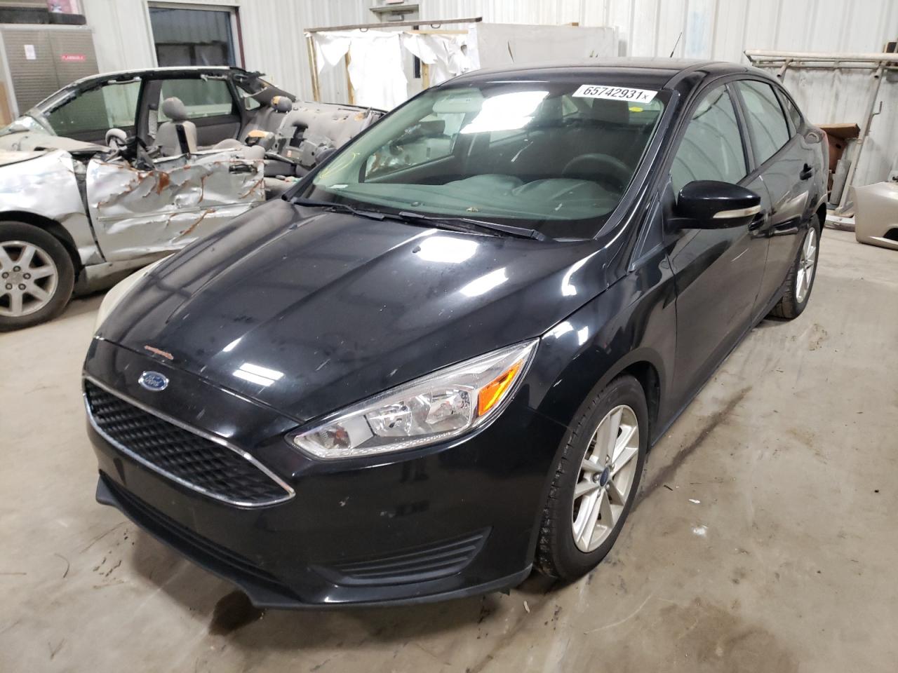 Photo 2 from auction – 2015 FORD FOCUS SE with VIN 1FADP3FE9FL381992