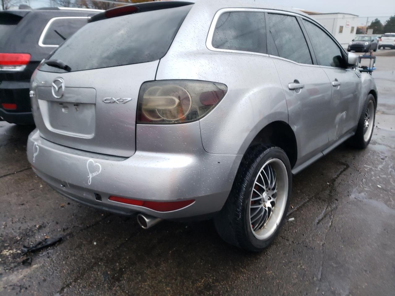 Photo 4 from auction – 2011 MAZDA CX-7 with VIN JM3ER2A51B0396600