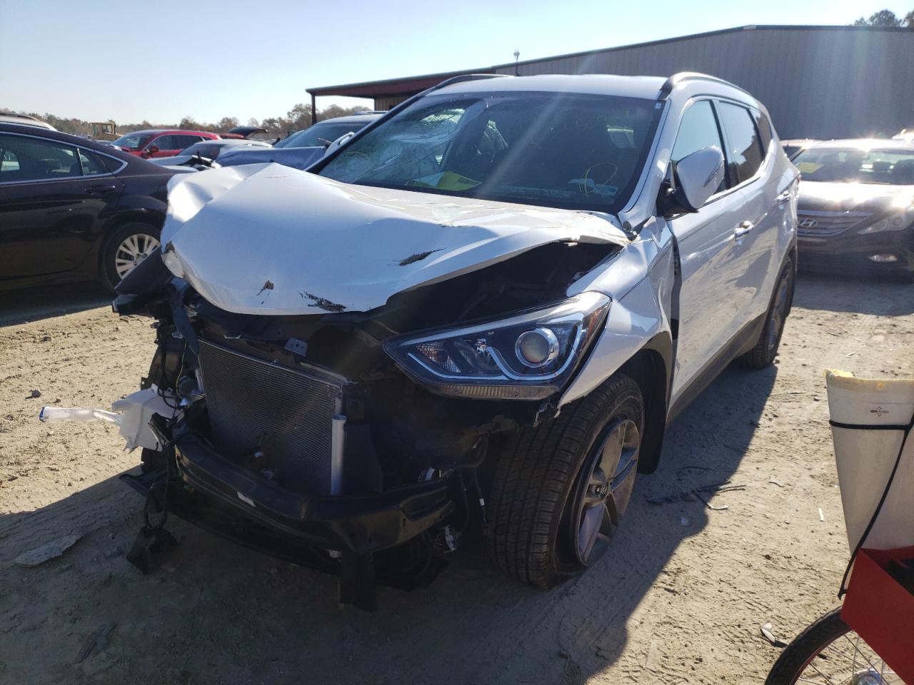 Photo 2 from auction – 2018 HYUNDAI SANTA FE S with VIN 5NMZU3LB6JH097829