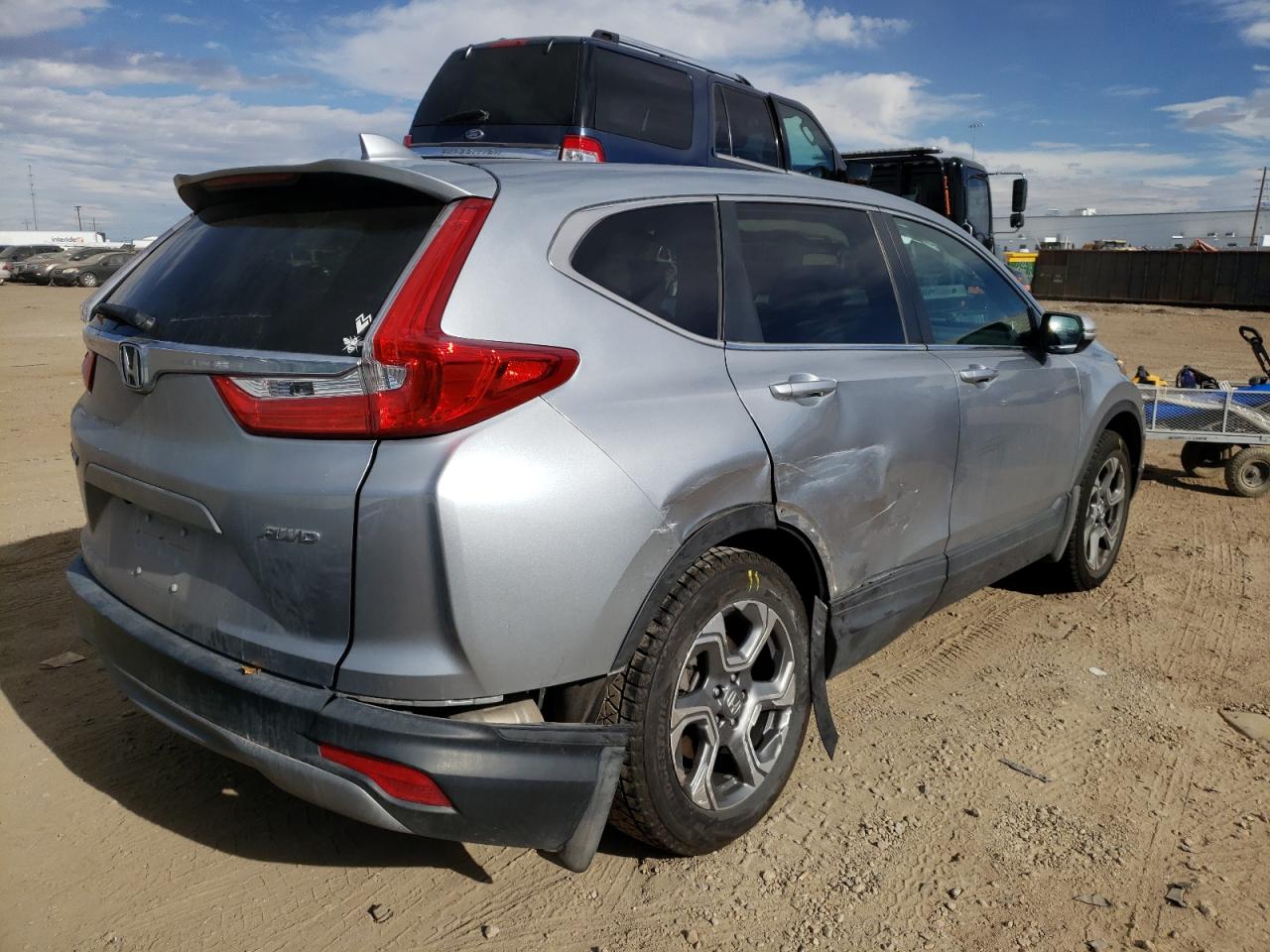 Photo 4 from auction – 2019 HONDA CR-V EX with VIN 5J6RW2H50KA011623