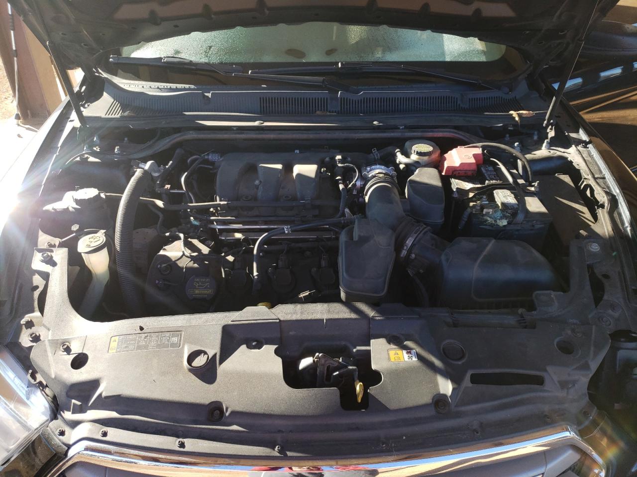 Photo 7 from auction – 2013 FORD TAURUS SE with VIN 1FAHP2D86DG236083