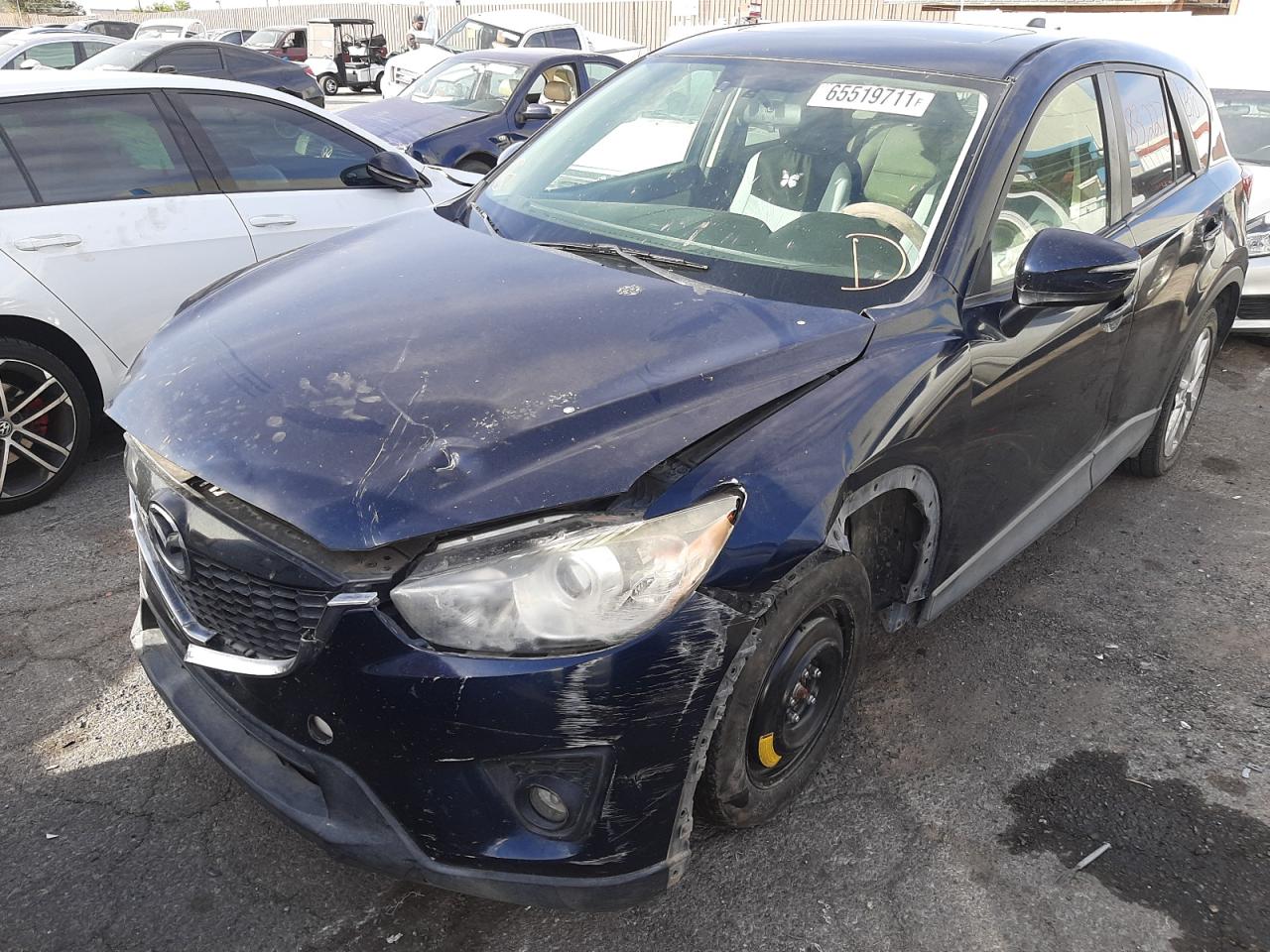 Photo 2 from auction – 2015 MAZDA CX-5 GT with VIN JM3KE2DY1F0518589
