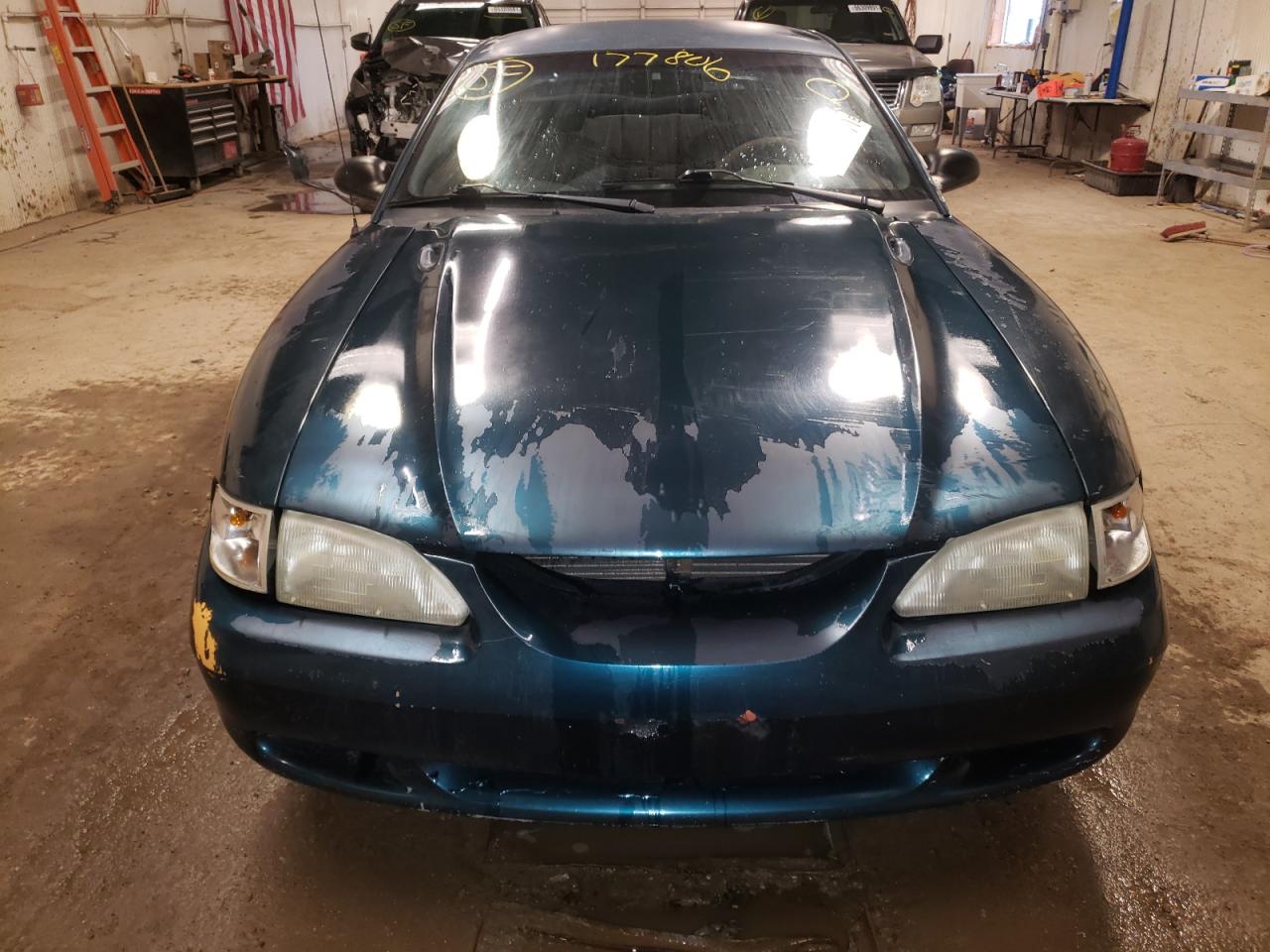 Photo 7 from auction – 1997 FORD MUSTANG with VIN 1FALP4049VF135135