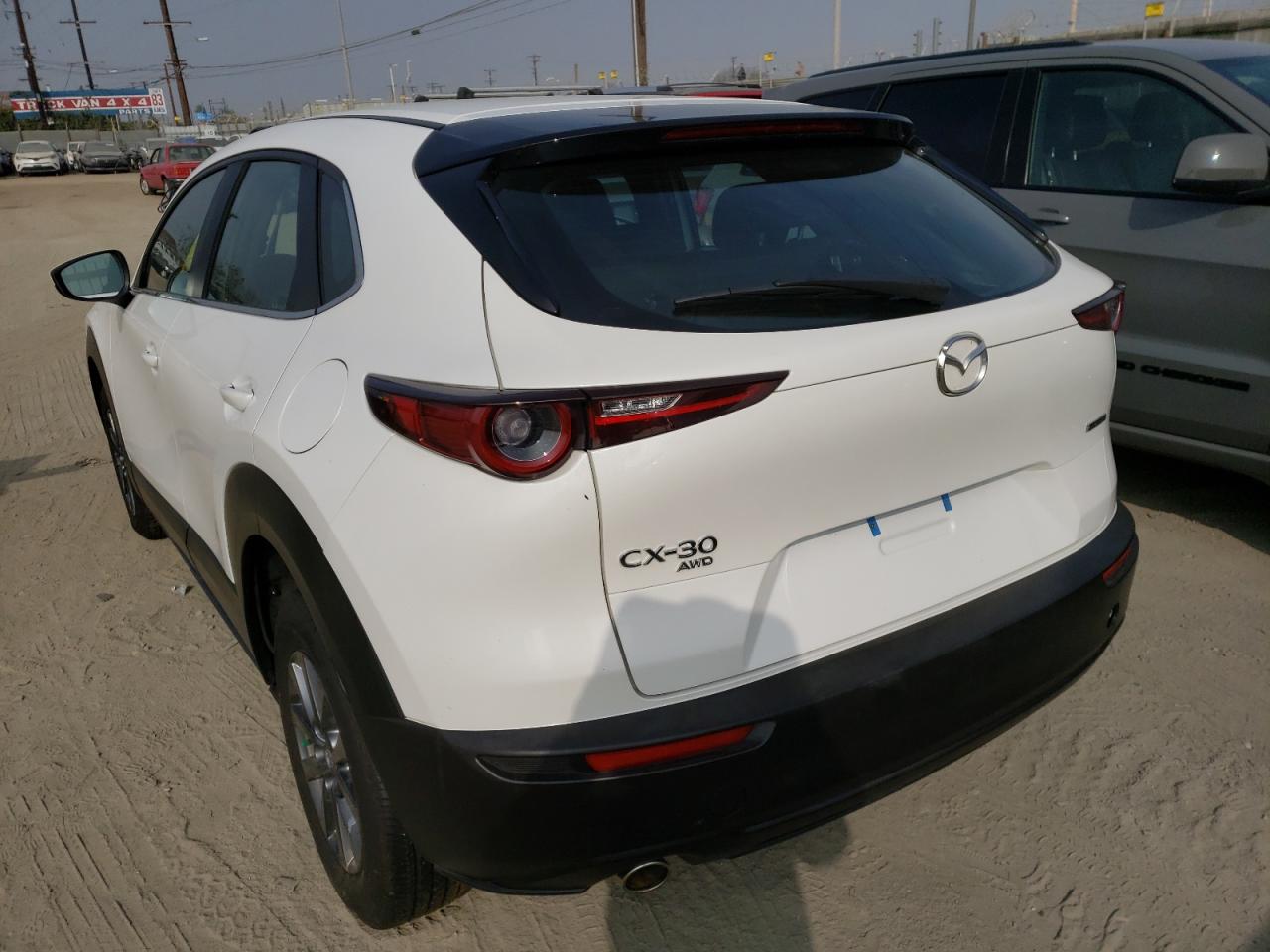Photo 3 from auction – 2021 MAZDA CX-30 with VIN 3MVDMBAL7MM215385