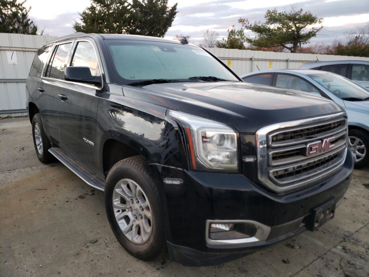 GMC YUKON SLT 2019 with VIN 1GKS2BKC0KR209229 - Photo from auction