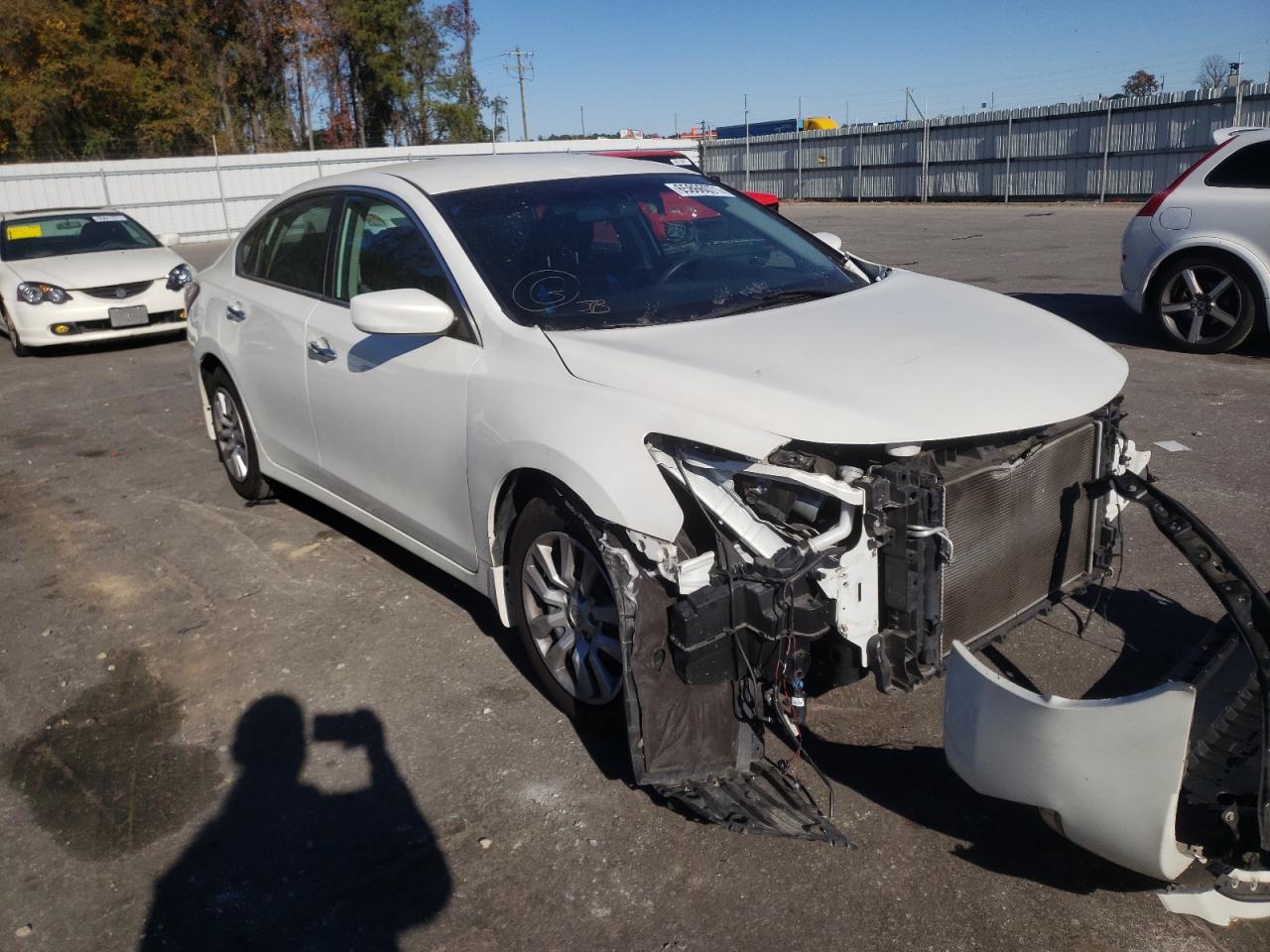 NISSAN ALTIMA 2.5 2015 with VIN 1N4AL3AP0FC197399 - Photo from auction