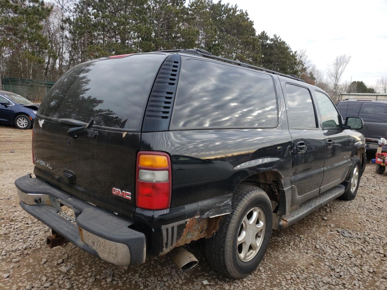 Photo 4 from auction – 2002 GMC YUKON DENA with VIN 1GKFK66U22J340558
