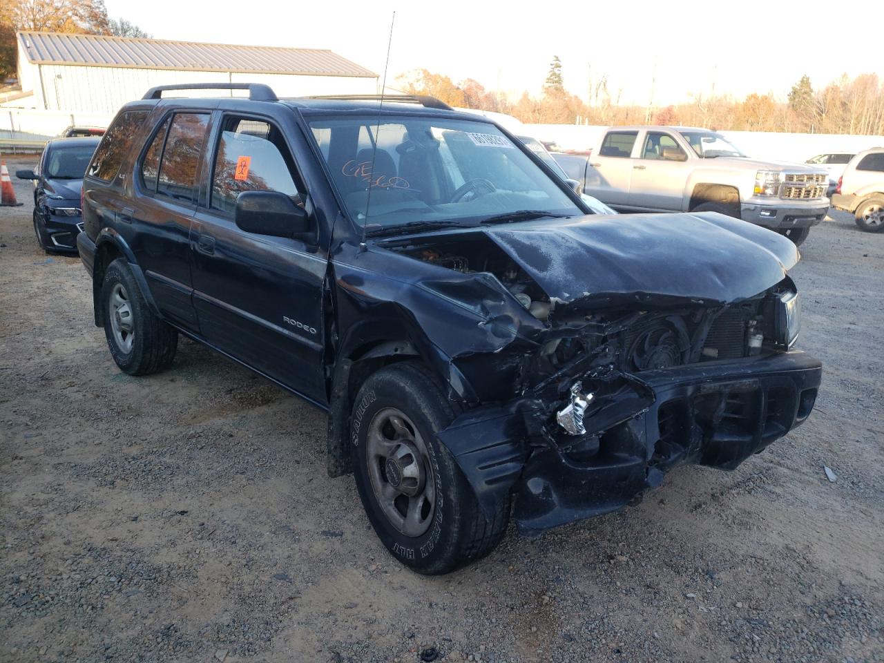 ISUZU RODEO 2000 with VIN 4S2DM58W8Y4320297 - Photo from auction