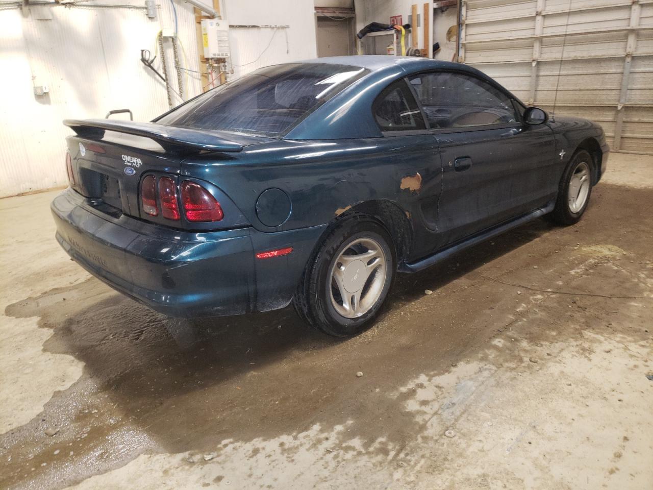 Photo 4 from auction – 1997 FORD MUSTANG with VIN 1FALP4049VF135135