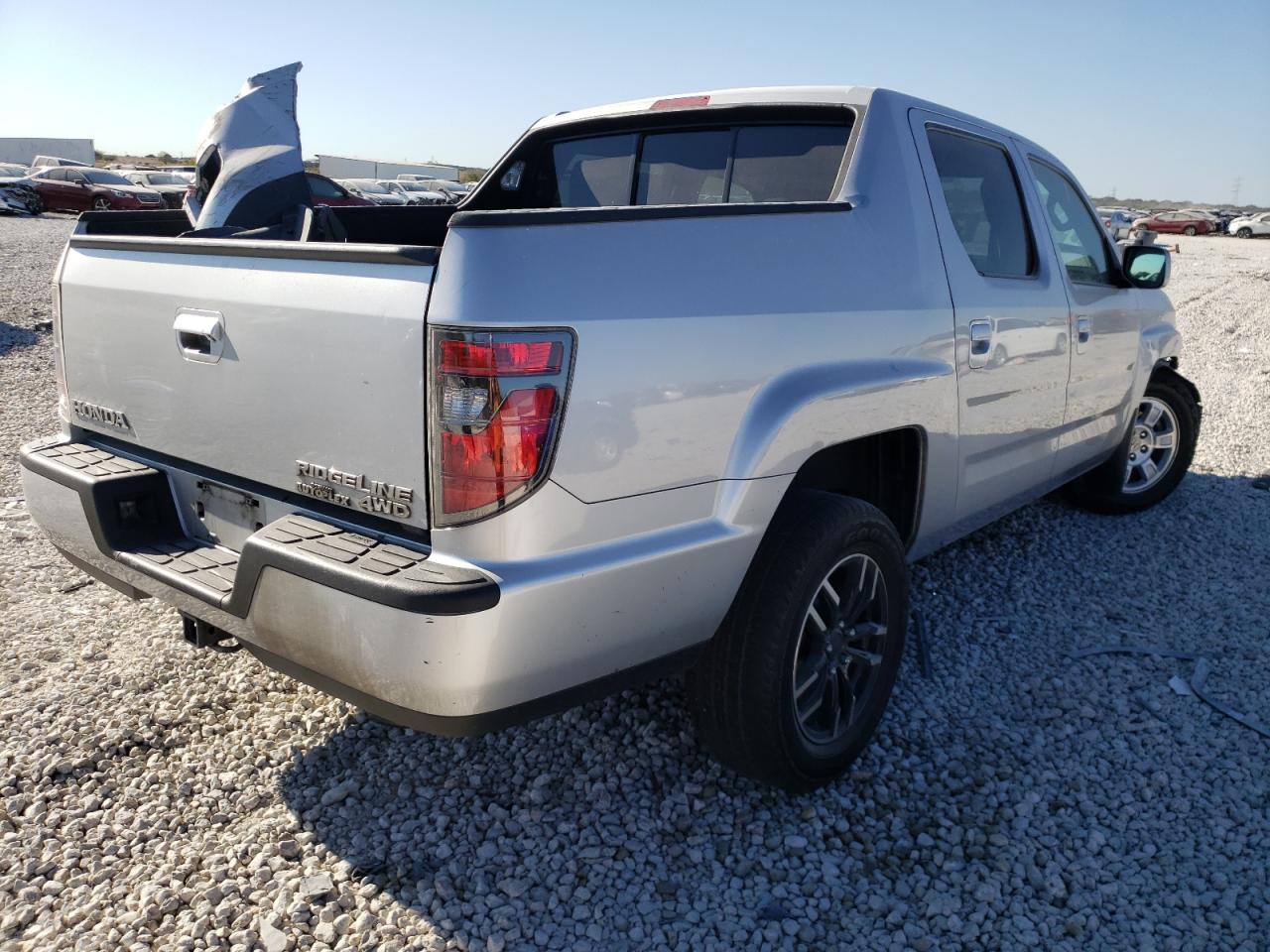 Photo 4 from auction – 2013 HONDA RIDGELINE with VIN 5FPYK1F42DB014817