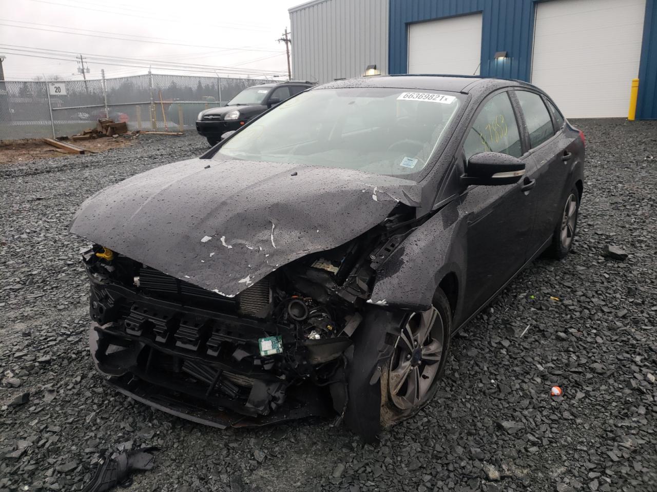 Photo 2 from auction – 2017 FORD FOCUS SE with VIN 1FADP3FE0HL261081