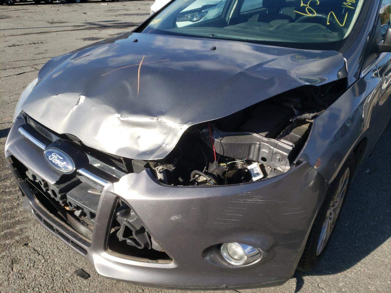 Photo 9 from auction – 2012 FORD FOCUS SEL with VIN 1FAHP3M20CL372099