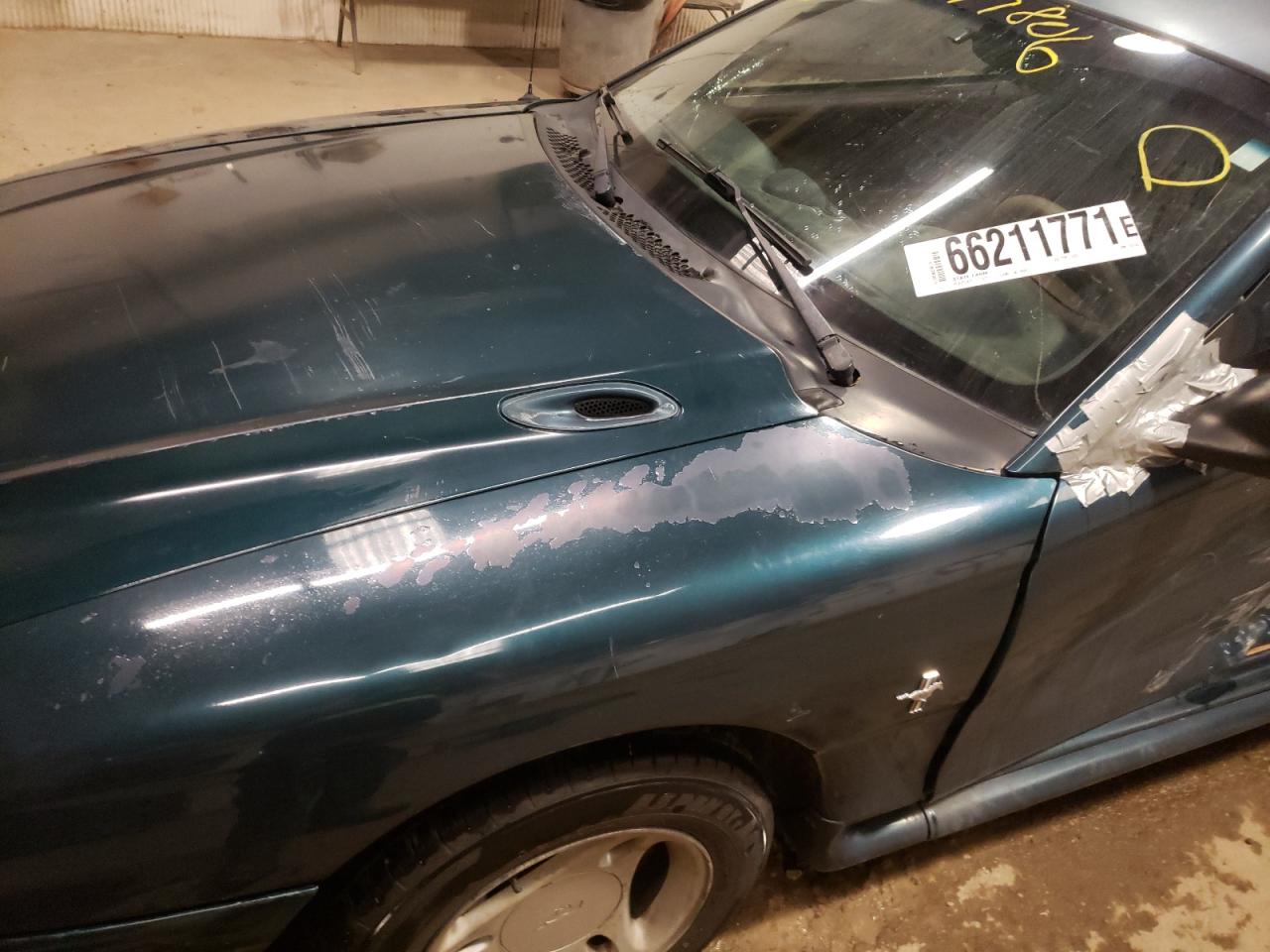 Photo 10 from auction – 1997 FORD MUSTANG with VIN 1FALP4049VF135135