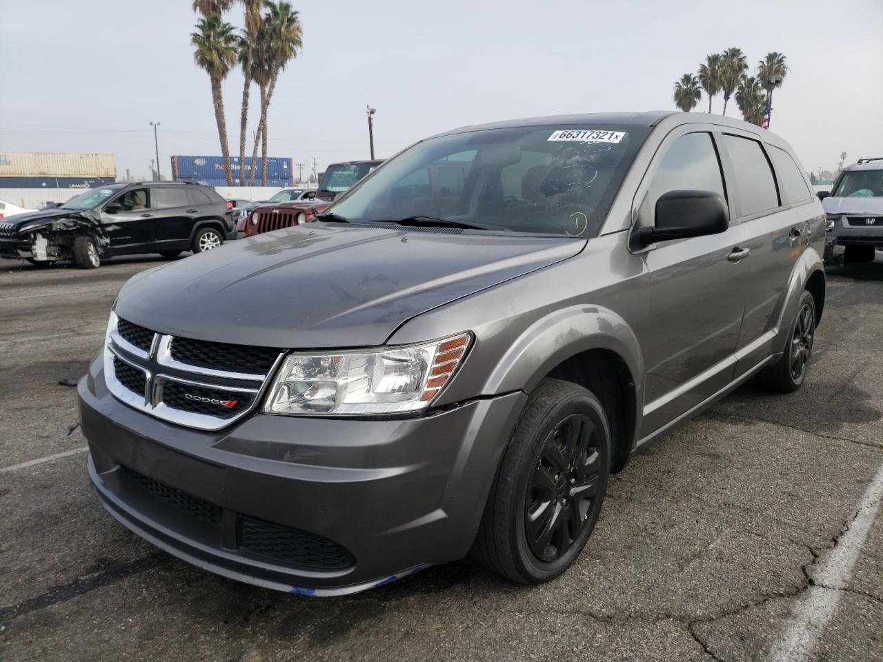 Photo 2 from auction – 2013 DODGE JOURNEY SE with VIN 3C4PDCABXDT729491