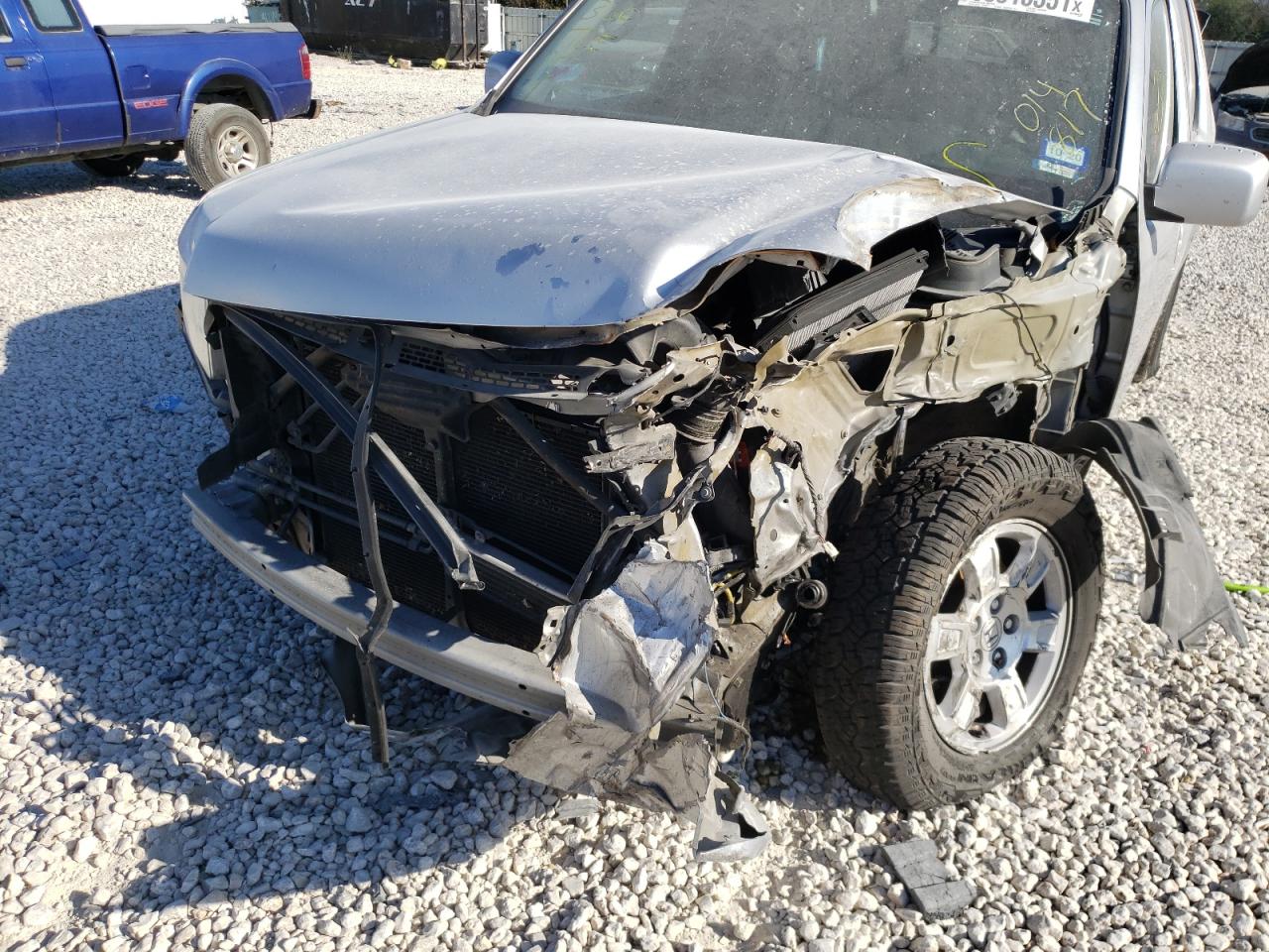 Photo 9 from auction – 2013 HONDA RIDGELINE with VIN 5FPYK1F42DB014817