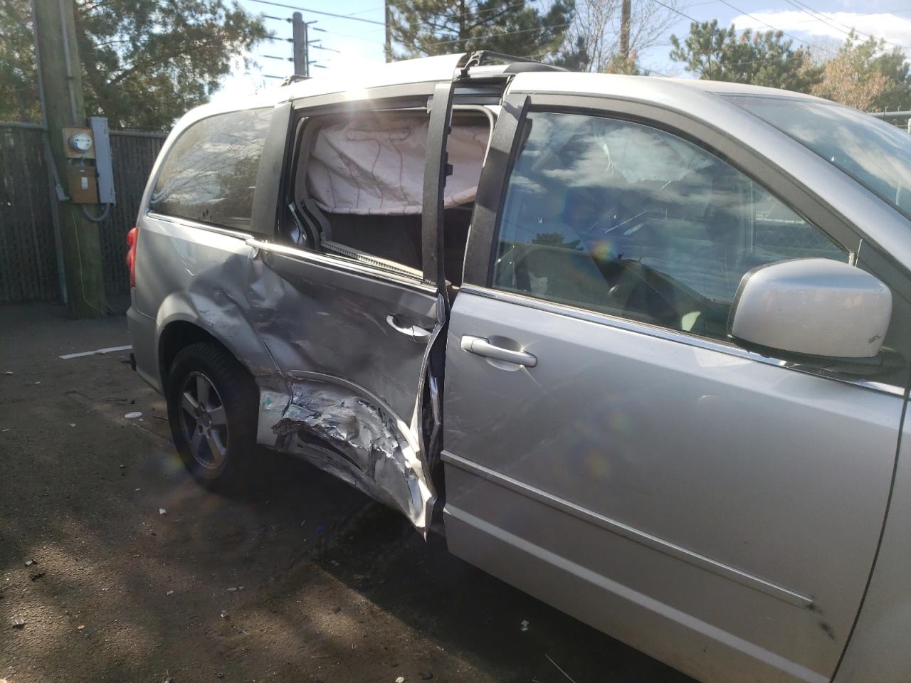 Photo 9 from auction – 2011 DODGE GRAND CARA with VIN 2D4RN5DG1BR693704