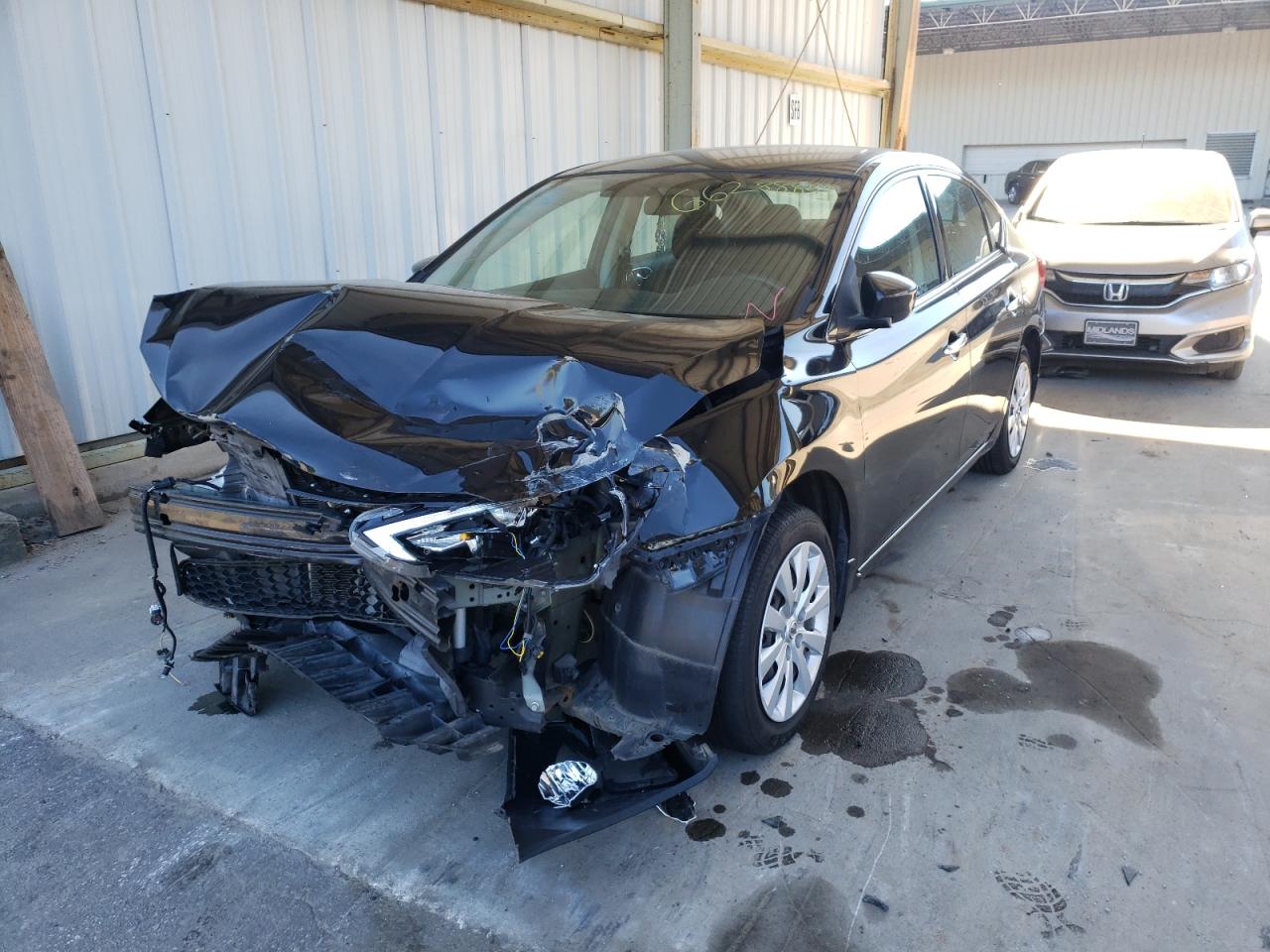 Photo 2 from auction – 2016 NISSAN SENTRA S with VIN 3N1AB7AP0GL641359