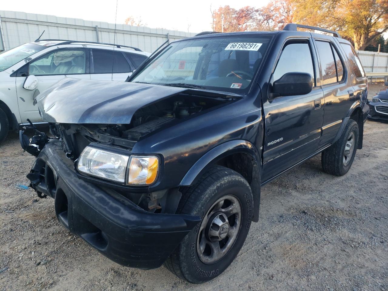 Photo 2 from auction – 2000 ISUZU RODEO with VIN 4S2DM58W8Y4320297