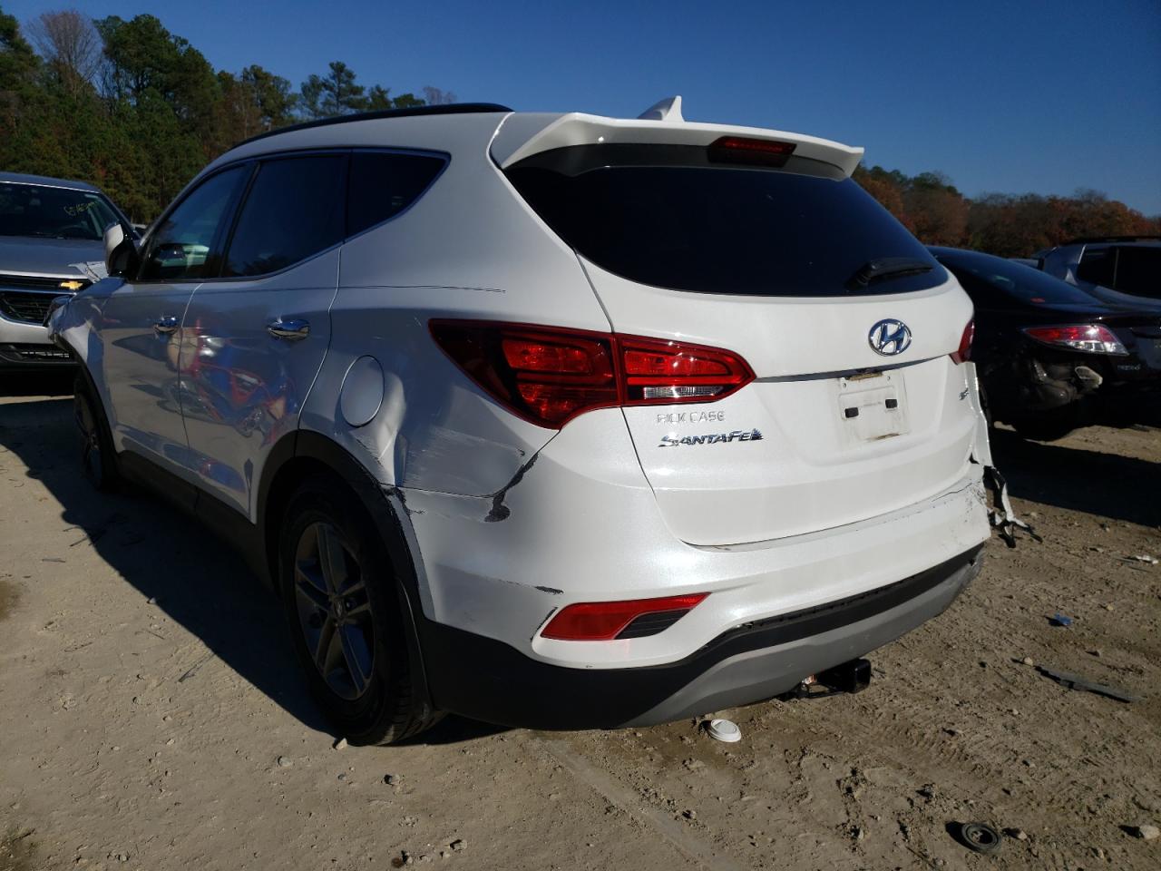 Photo 3 from auction – 2018 HYUNDAI SANTA FE S with VIN 5NMZU3LB6JH097829