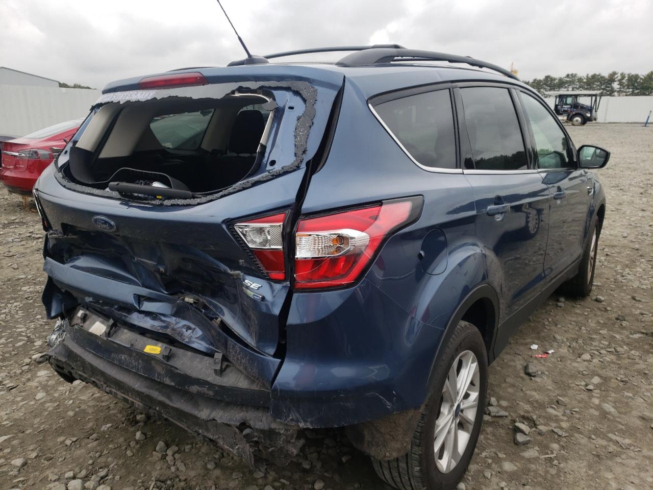 Photo 4 from auction – 2018 FORD ESCAPE SE with VIN 1FMCU9GD7JUC84411