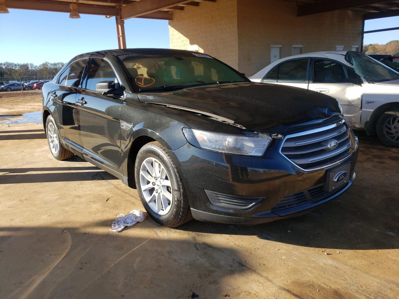 FORD TAURUS SE 2013 with VIN 1FAHP2D86DG236083 - Photo from auction