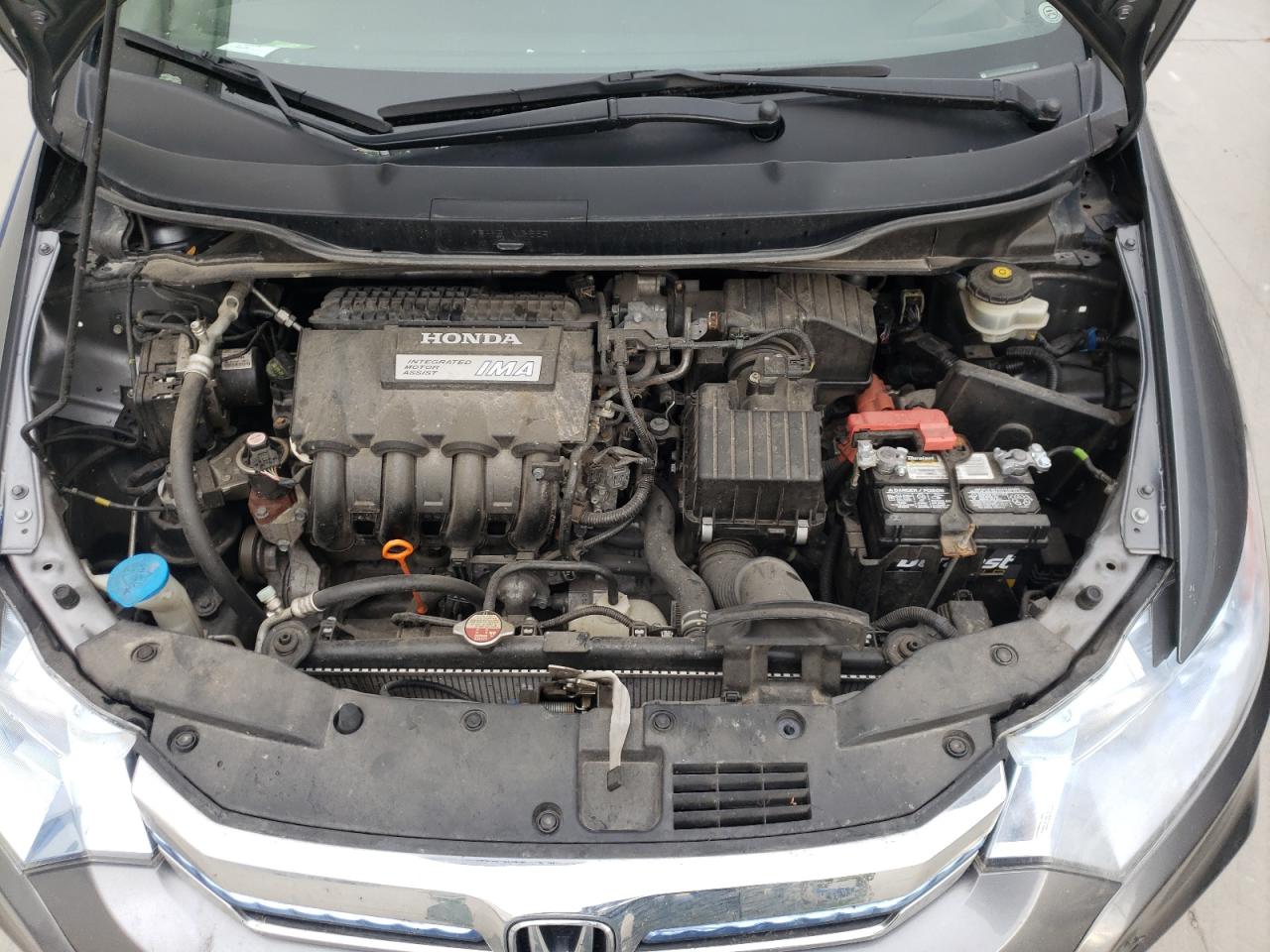 Photo 7 from auction – 2013 HONDA INSIGHT with VIN JHMZE2H7XDS006158