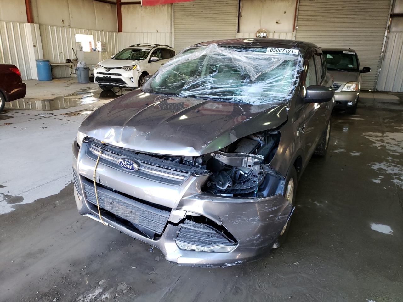 Foto 9 de la subasta – 2014 FORD ESCAPE SE con VIN 1FMCU9GX4EUB90874