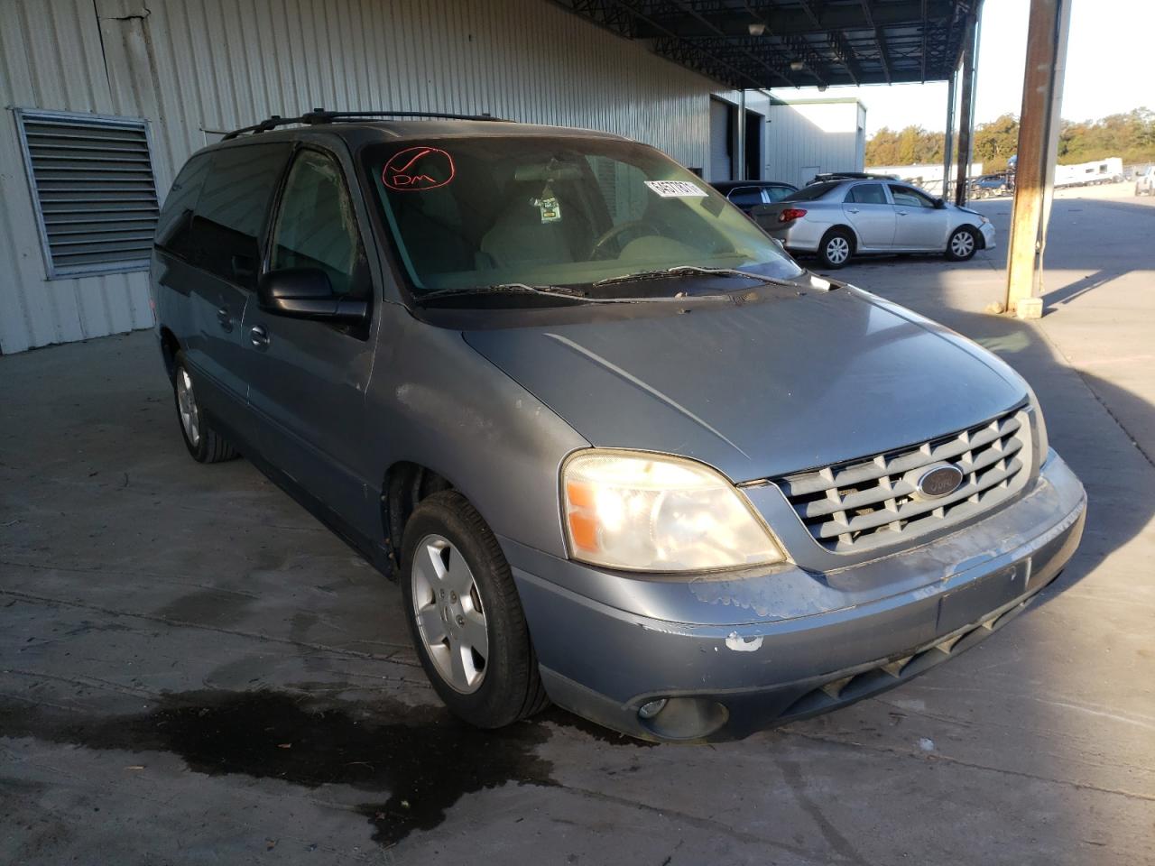 FORD FREESTAR S 2004 with VIN 2FMZA57674BA77329 - Photo from auction