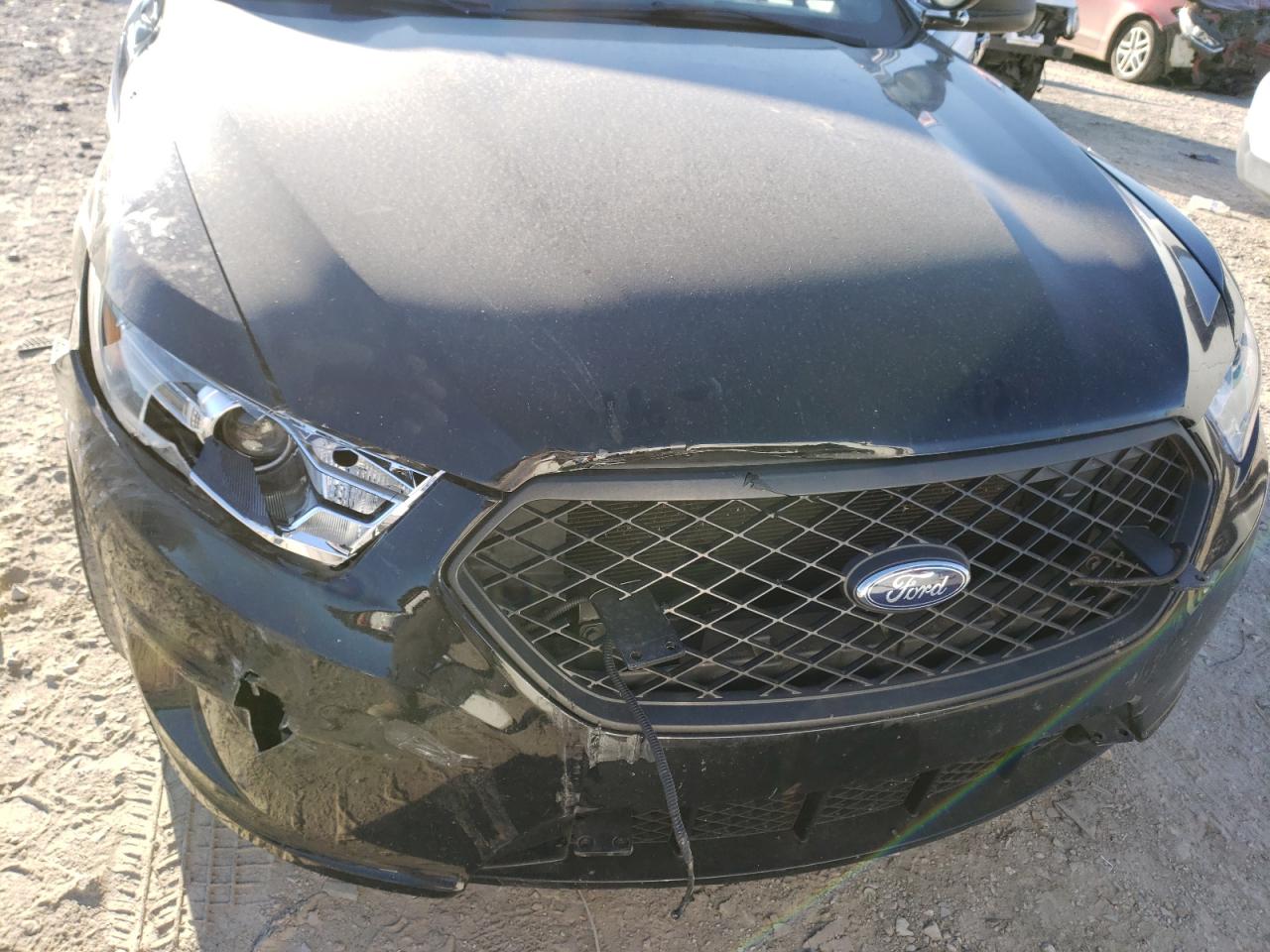Photo 9 from auction – 2016 FORD TAURUS POL with VIN 1FAHP2MK6GG117515
