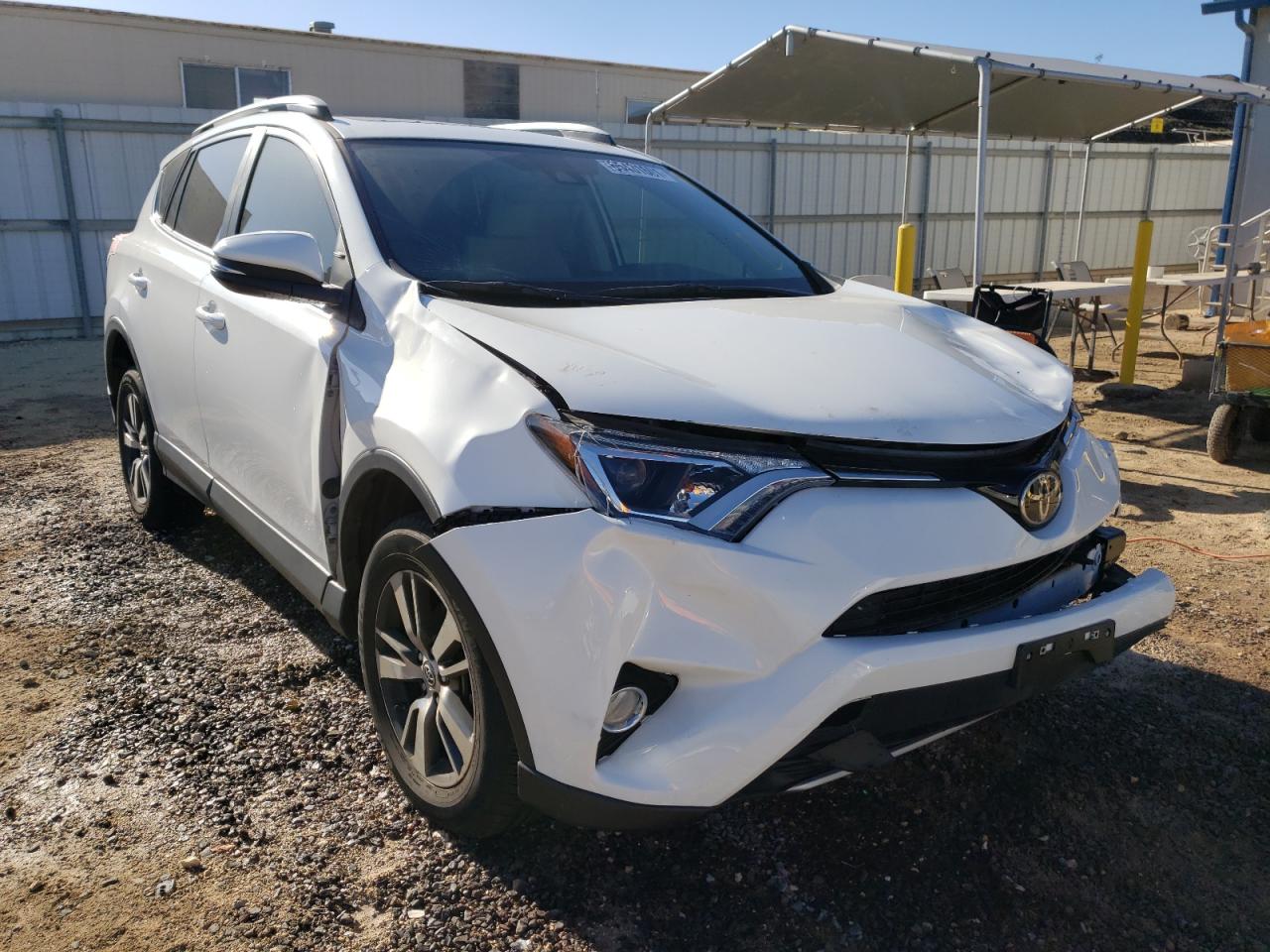 Photo 1 from auction – 2017 TOYOTA RAV4 XLE with VIN JTMWFREV1HJ135818