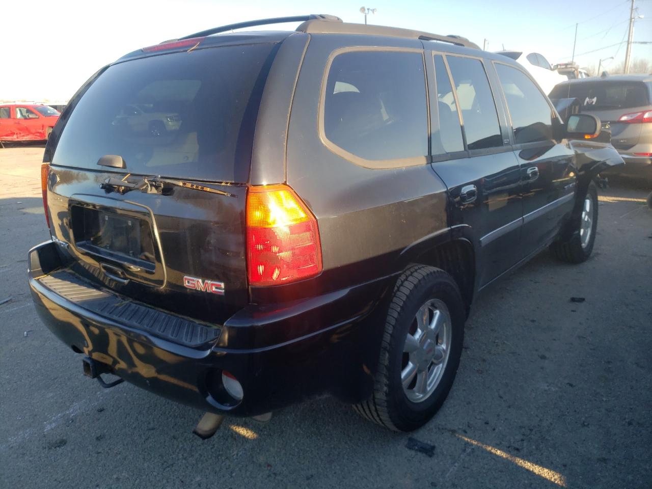 Photo 4 from auction – 2006 GMC ENVOY with VIN 1GKDT13SX62156348