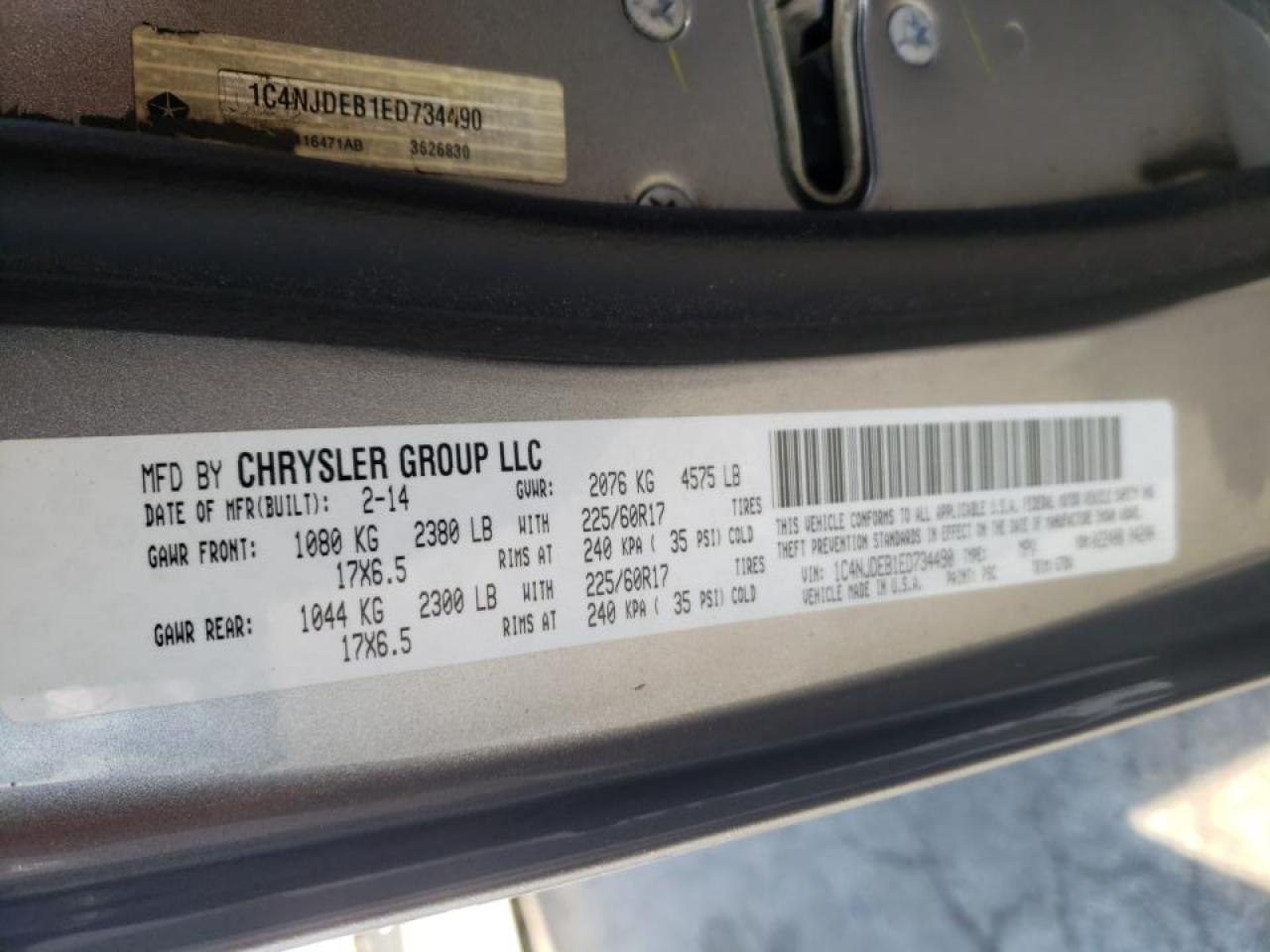Photo 10 from auction – 2014 JEEP COMPASS LA with VIN 1C4NJDEB1ED734490