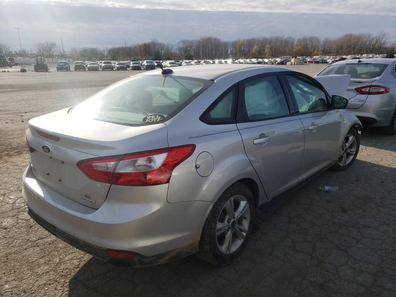 Photo 4 from auction – 2014 FORD FOCUS SE with VIN 1FADP3F28EL288272