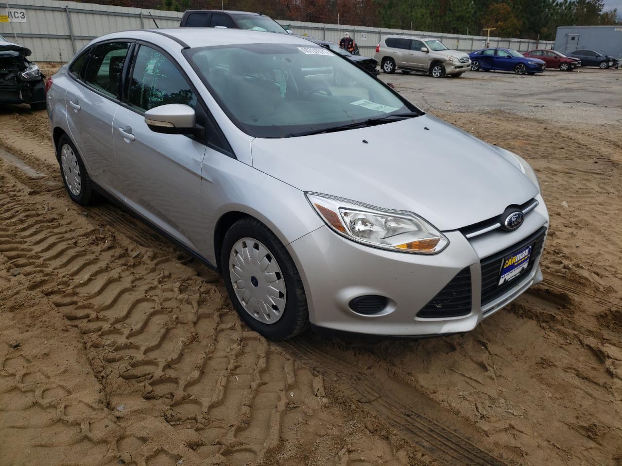 FORD FOCUS SE 2014 with VIN 1FADP3F28EL393815 - Photo from auction