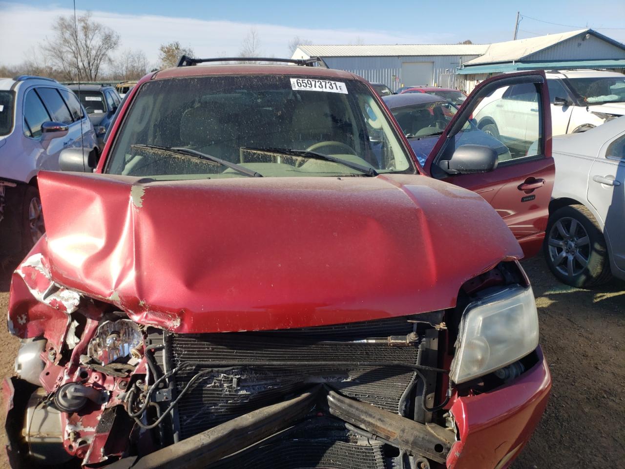 Photo 7 from auction – 2006 MERCURY MARINER with VIN 4M2CU57106DJ03573