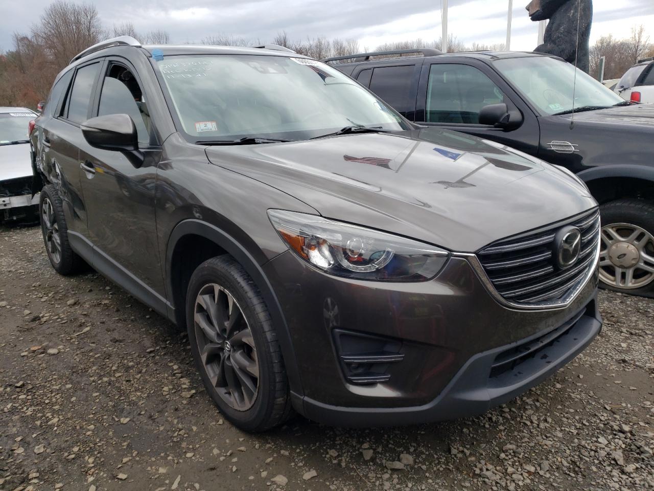 MAZDA CX-5 GT 2016 with VIN JM3KE4DYXG0816233 - Photo from auction