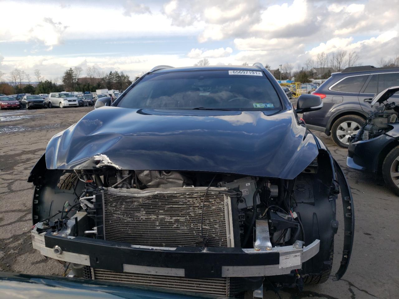 Photo 9 from auction – 2017 INFINITI QX30 BASE with VIN SJKCH5CR3HA030559