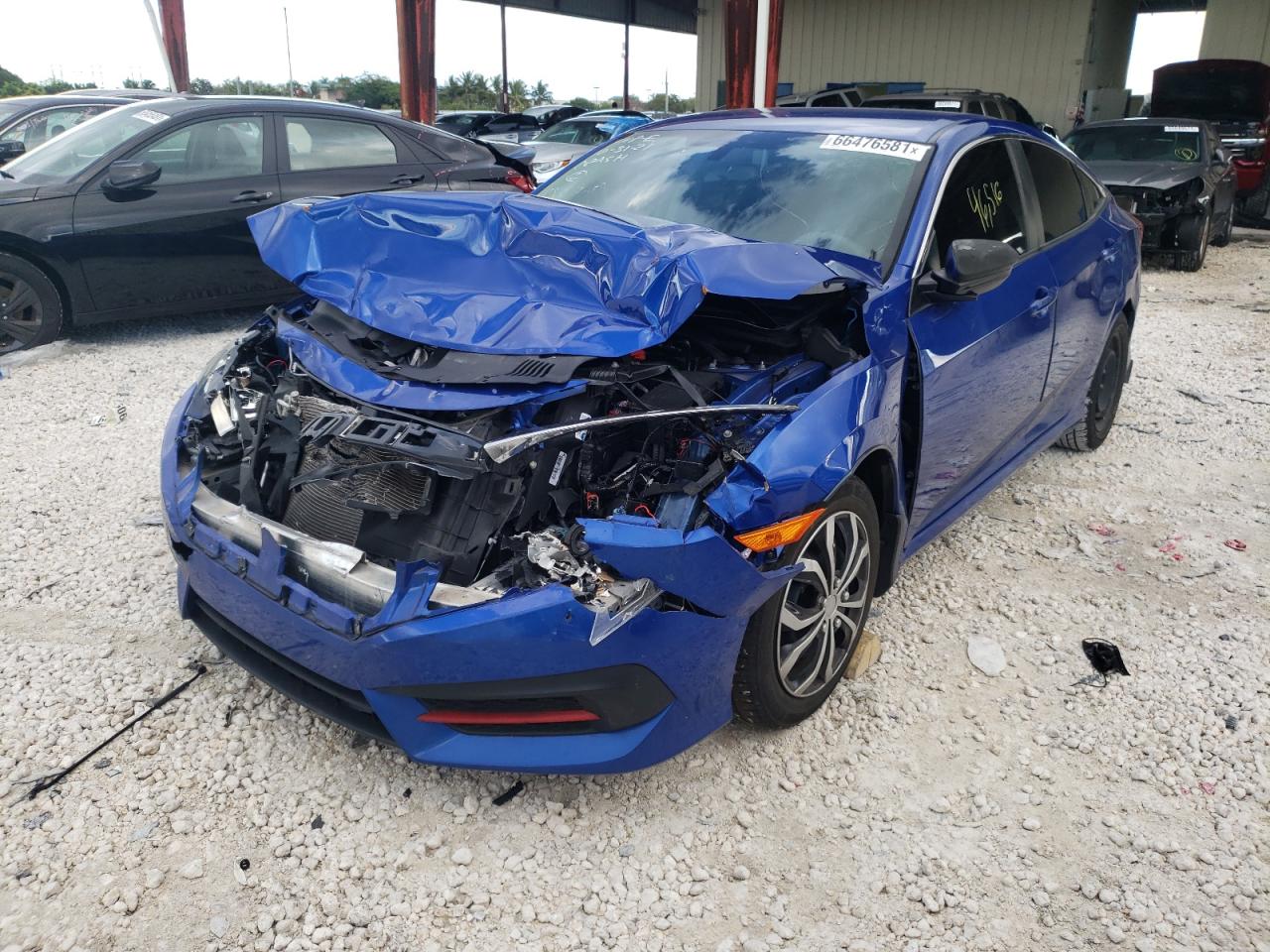 Photo 2 from auction – 2016 HONDA CIVIC LX with VIN 19XFC2F57GE046927