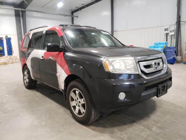 HONDA PILOT TOUR 2011 with VIN 5FNYF3H9XBB041150 - Photo from auction