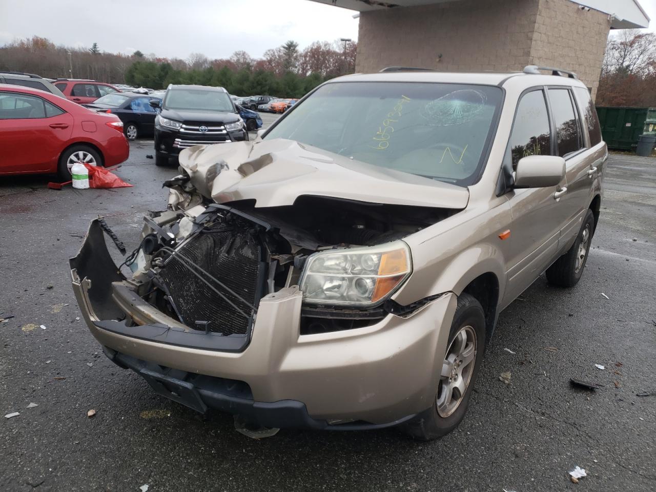 Photo 2 from auction – 2006 HONDA PILOT EX with VIN 2HKYF18426H518511