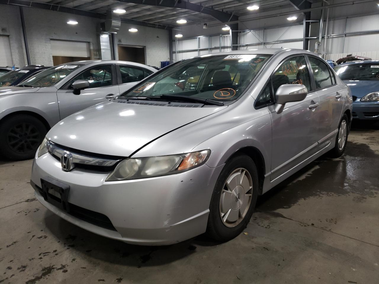 Photo 2 from auction – 2007 HONDA CIVIC HYBR with VIN JHMFA36227S007966