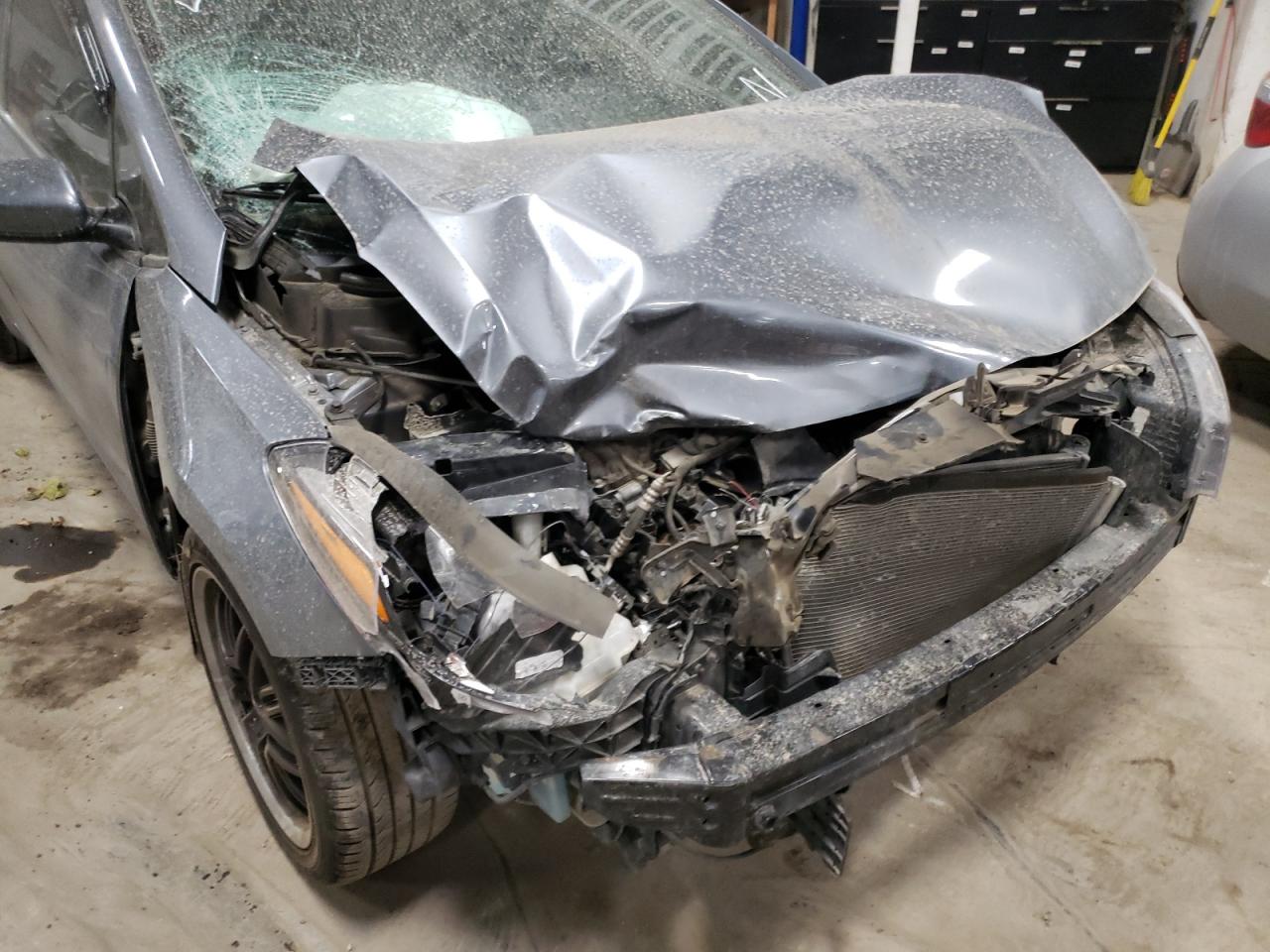Photo 9 from auction – 2017 KIA FORTE LX with VIN 3KPFL4A7XHE012826