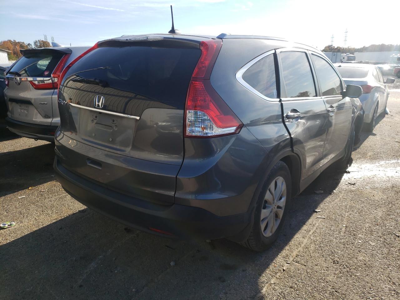 Photo 4 from auction – 2014 HONDA CR-V EXL with VIN 2HKRM3H72EH542080