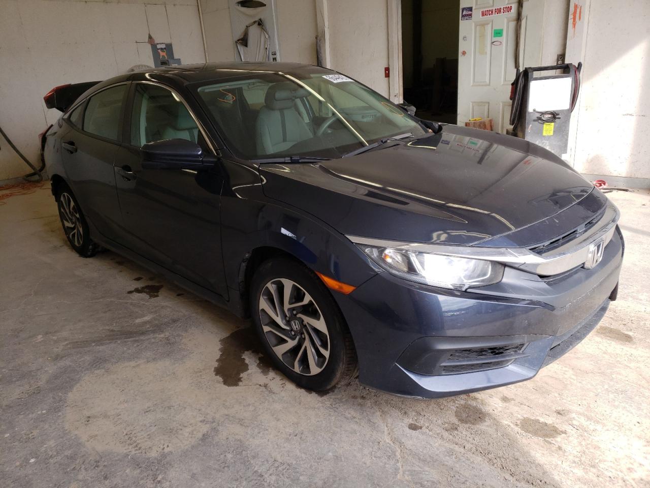 HONDA CIVIC EX 2018 with VIN 2HGFC2F78JH586320 - Photo from auction
