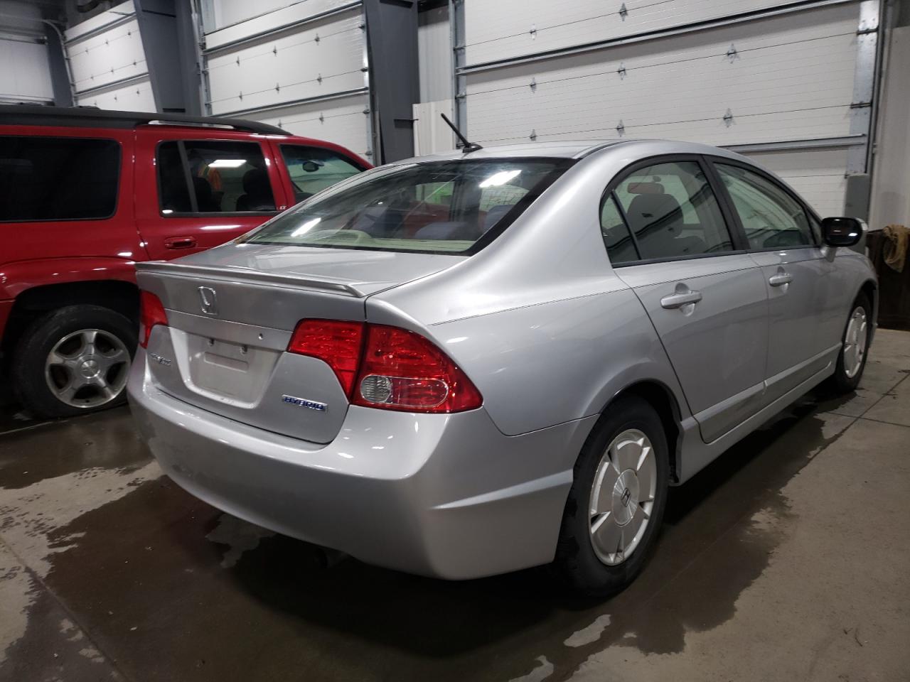 Photo 4 from auction – 2007 HONDA CIVIC HYBR with VIN JHMFA36227S007966