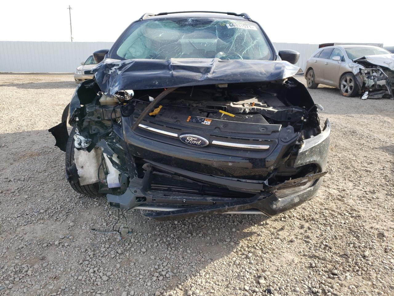 Photo 9 from auction – 2016 FORD ESCAPE SE with VIN 1FMCU9GX4GUB75598