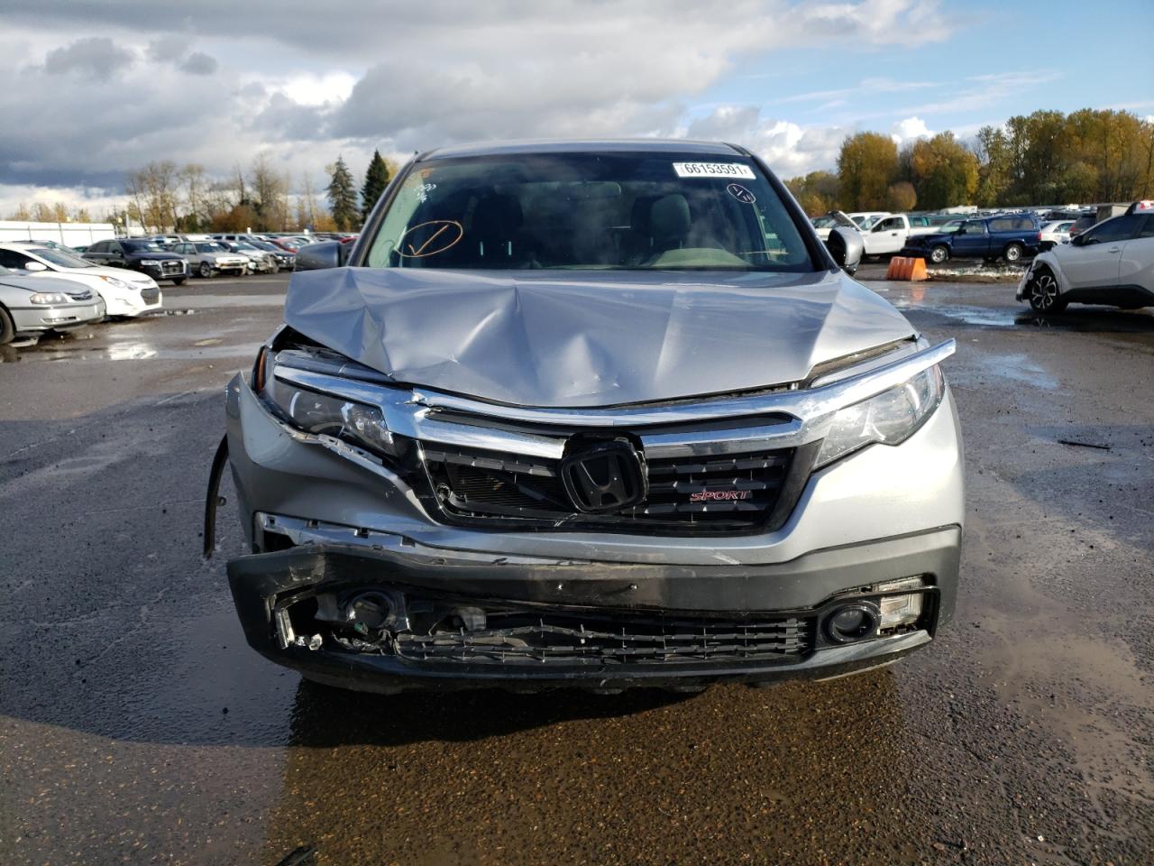 Photo 9 from auction – 2019 HONDA RIDGELINE with VIN 5FPYK3F11KB046902