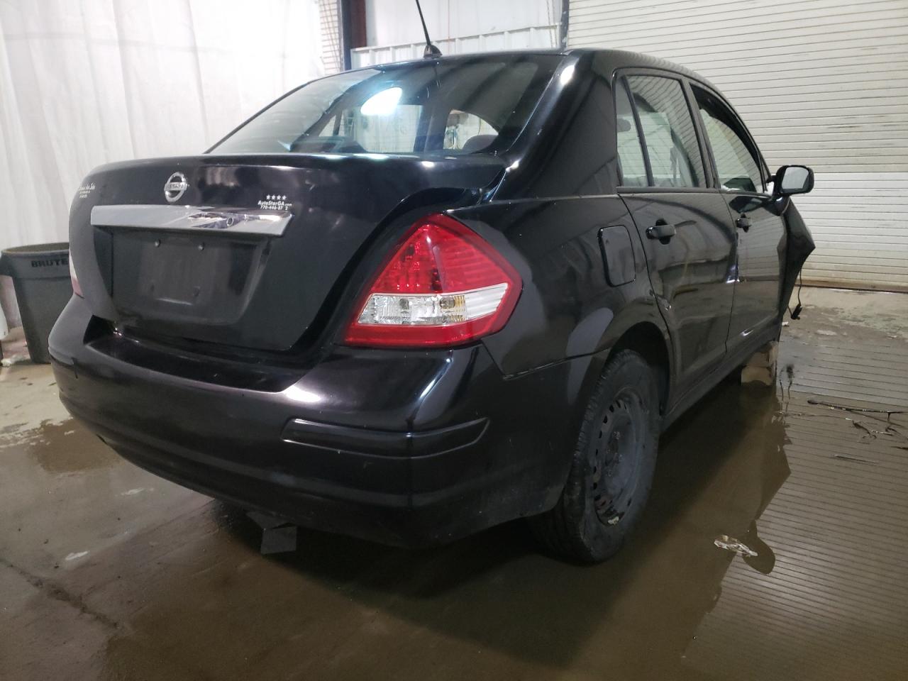 Photo 4 from auction – 2009 NISSAN VERSA S with VIN 3N1BC11E59L392556